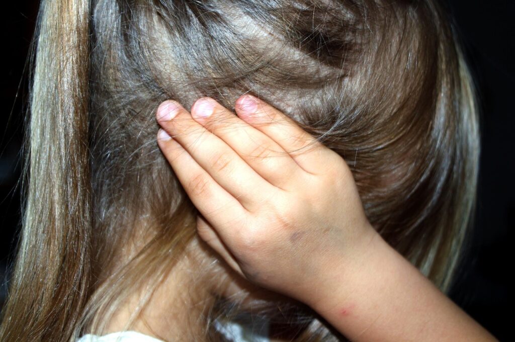 child, girl, fear, oppression, distress, pain, mourning, depression, threatened, domestic violence, hand, kid, young, gesture